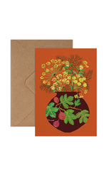 Greeting card with floral design and brown envelope on white background